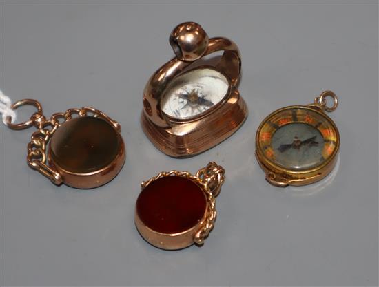 A carnelian set pinchbeck watch fob, two 9ct gold bloodstone/carnelian fobs and a 9ct gold compass fob